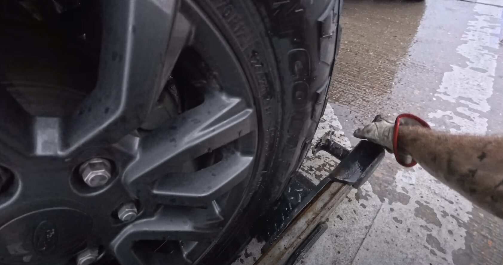 Professional towing service protecting and securing a vehicle during roadside assistance